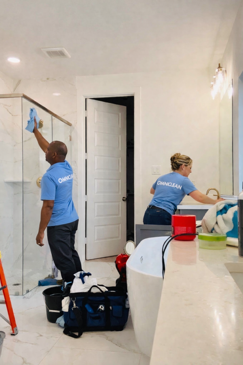 Omni Clean team cleaning a bathroom in Houston
